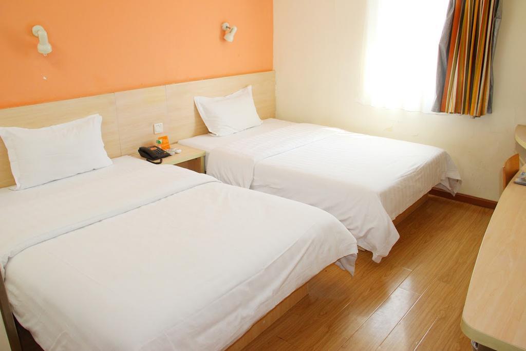7Days Inn Qingdao Haiyunan Xinglong Road Værelse billede