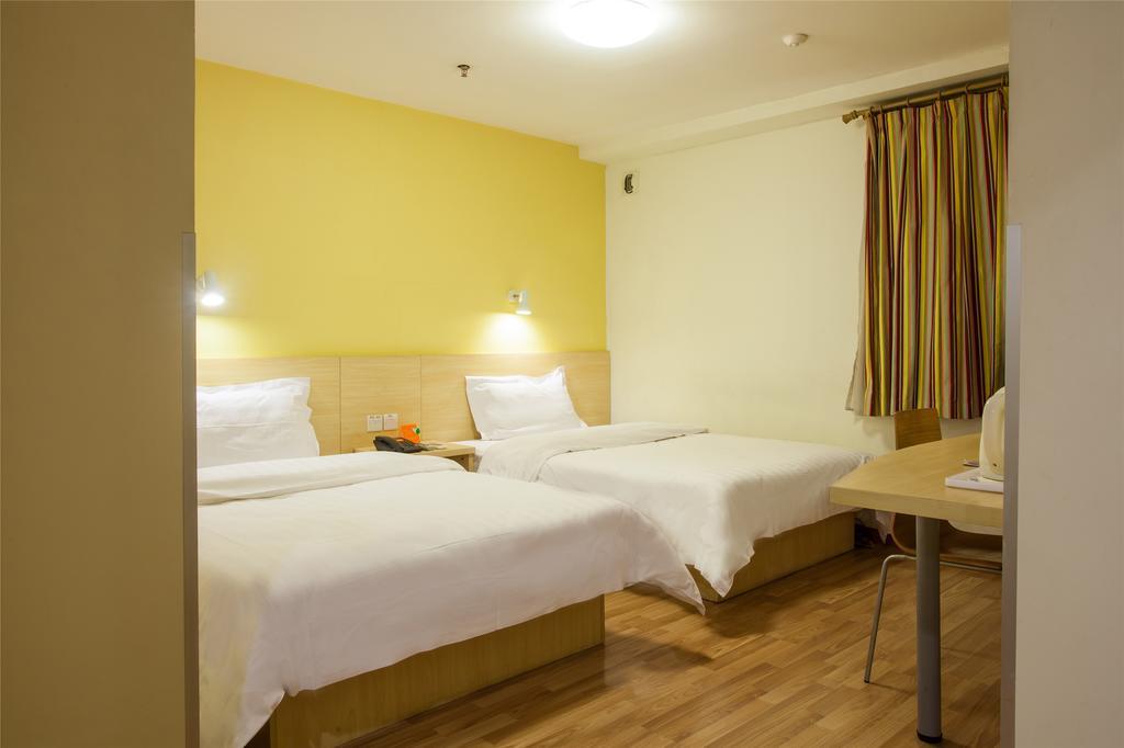 7Days Inn Qingdao Haiyunan Xinglong Road Værelse billede