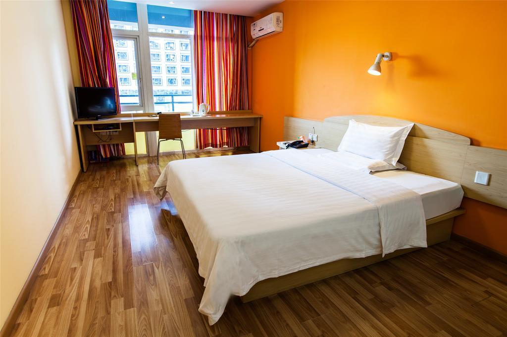 7Days Inn Qingdao Haiyunan Xinglong Road Værelse billede